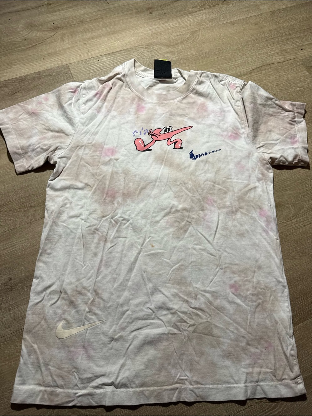 Nike Men’s White Short-Sleeve Graphic Tee with Pink Accents